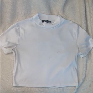 A white belly shirt/crop top from Forever 21.